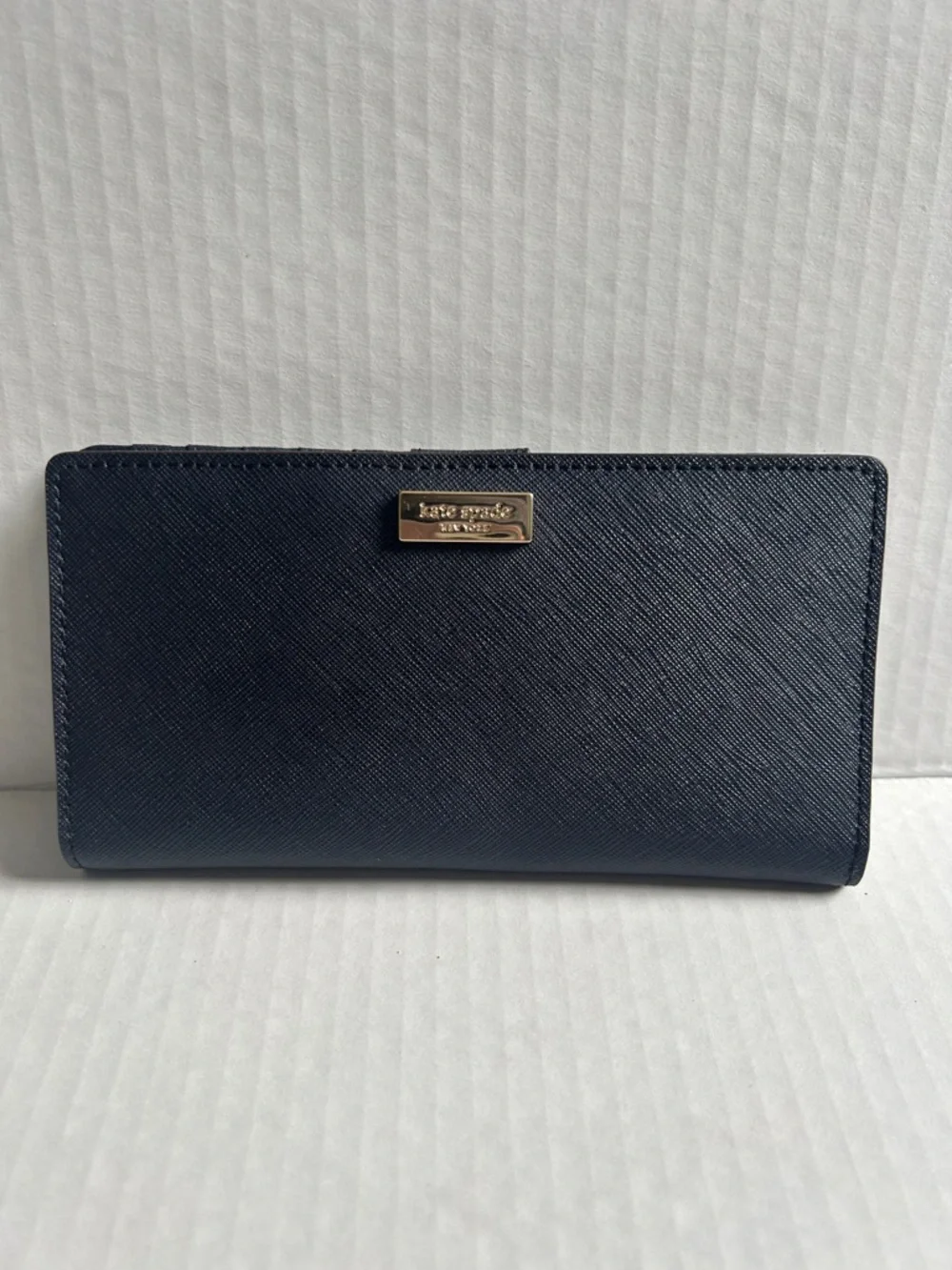 Kate Spade Newbury Lane Stacy Bifold Wallet In Navy Leather